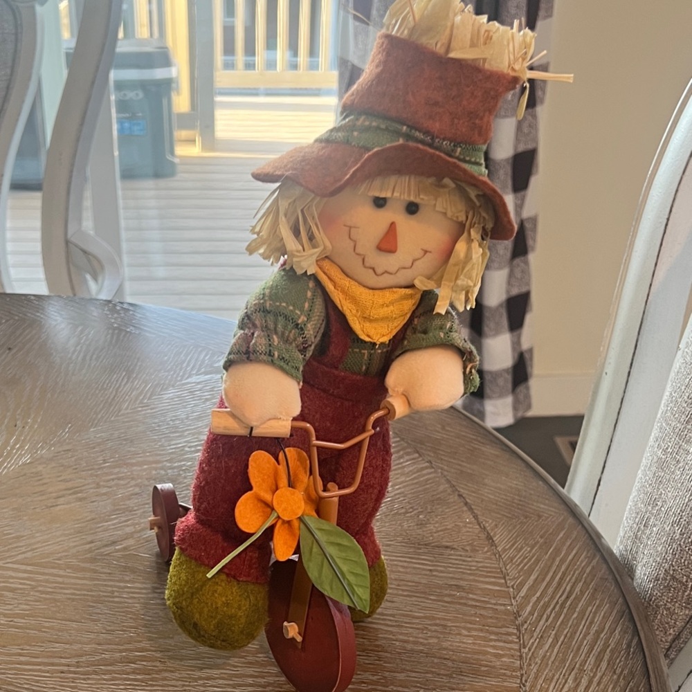 Festive Scarecrow Decoration with Orange Accents